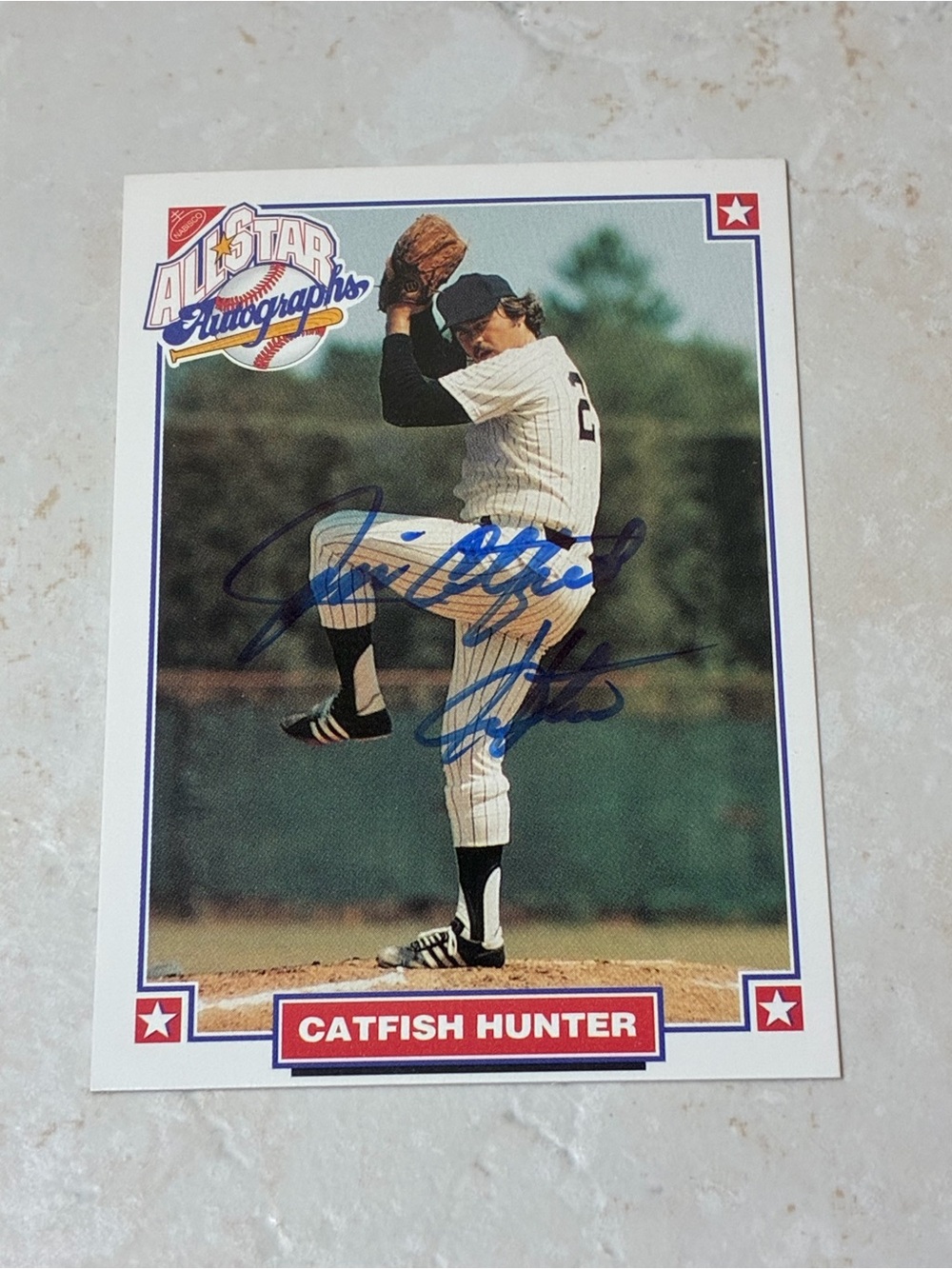 Autographed Jim “Catfish” Hunter Baseball Card